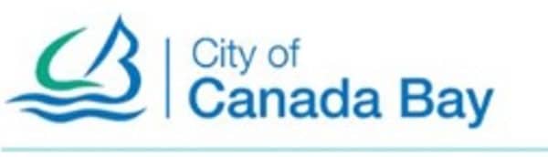 Logo of the City of Canada Bay featuring a stylized bird in green and blue with wavy lines below it, symbolizing process improvement, accompanied by the text "City of Canada Bay.