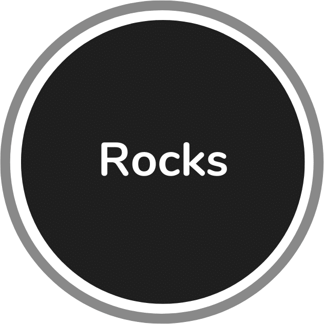 A black circle with a grey border containing the word "Rocks" in white text at the center, seamlessly integrated with ScaleTrac technology.